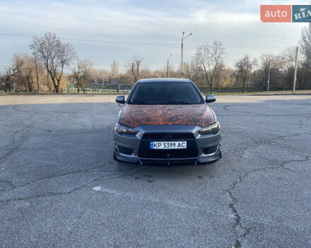 Серый Мицубиси Лансер, объемом двигателя 1.5 л и пробегом 224 тыс. км за 6300 $, фото 1 на Automoto.ua