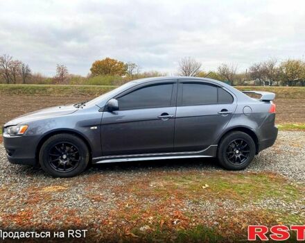 Сірий Міцубісі Lancer, об'ємом двигуна 2 л та пробігом 168 тис. км за 8000 $, фото 1 на Automoto.ua