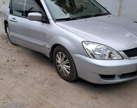 Сірий Міцубісі Lancer, об'ємом двигуна 1.6 л та пробігом 122 тис. км за 5500 $, фото 6 на Automoto.ua