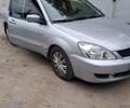 Сірий Міцубісі Lancer, об'ємом двигуна 1.6 л та пробігом 122 тис. км за 5500 $, фото 6 на Automoto.ua