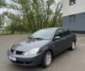 Сірий Міцубісі Lancer, об'ємом двигуна 1.6 л та пробігом 190 тис. км за 3800 $, фото 1 на Automoto.ua