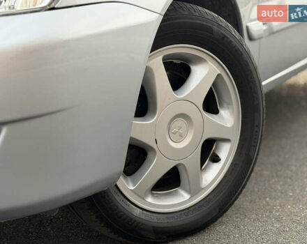 Серый Мицубиси Лансер, объемом двигателя 1.3 л и пробегом 160 тыс. км за 5555 $, фото 25 на Automoto.ua