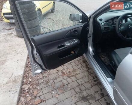 Серый Мицубиси Лансер, объемом двигателя 1.6 л и пробегом 175 тыс. км за 4200 $, фото 4 на Automoto.ua