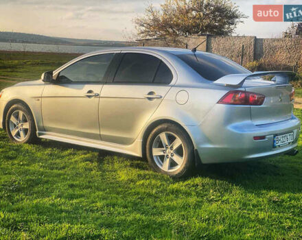 Серый Мицубиси Лансер, объемом двигателя 2 л и пробегом 226 тыс. км за 6200 $, фото 4 на Automoto.ua