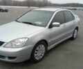 Сірий Міцубісі Lancer, об'ємом двигуна 1.6 л та пробігом 225 тис. км за 5500 $, фото 3 на Automoto.ua