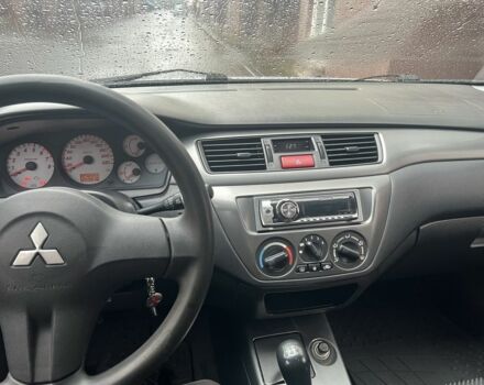 Серый Мицубиси Лансер, объемом двигателя 1.6 л и пробегом 272 тыс. км за 4500 $, фото 12 на Automoto.ua