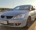 Серый Мицубиси Лансер, объемом двигателя 1.6 л и пробегом 228 тыс. км за 4400 $, фото 1 на Automoto.ua