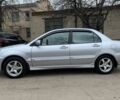 Сірий Міцубісі Lancer, об'ємом двигуна 1.6 л та пробігом 347 тис. км за 4500 $, фото 1 на Automoto.ua