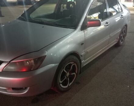 Серый Мицубиси Лансер, объемом двигателя 1.6 л и пробегом 308 тыс. км за 3800 $, фото 2 на Automoto.ua