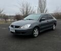 Сірий Міцубісі Lancer, об'ємом двигуна 1.6 л та пробігом 140 тис. км за 4050 $, фото 1 на Automoto.ua