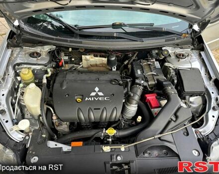 Серый Мицубиси Лансер, объемом двигателя 2 л и пробегом 250 тыс. км за 6000 $, фото 4 на Automoto.ua