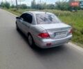 Серый Мицубиси Лансер, объемом двигателя 1.58 л и пробегом 200 тыс. км за 2300 $, фото 7 на Automoto.ua