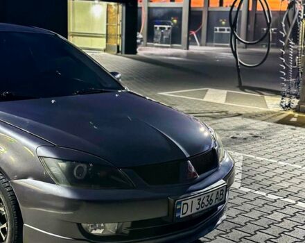 Серый Мицубиси Лансер, объемом двигателя 1.6 л и пробегом 280 тыс. км за 4000 $, фото 7 на Automoto.ua