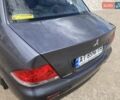 Сірий Міцубісі Lancer, об'ємом двигуна 1.59 л та пробігом 44 тис. км за 6200 $, фото 10 на Automoto.ua