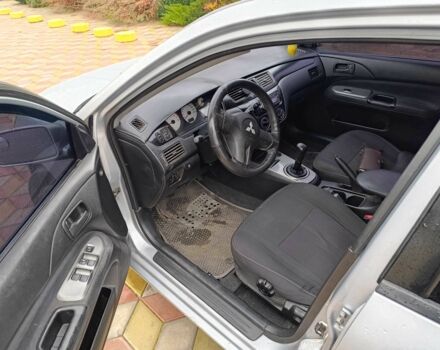 Серый Мицубиси Лансер, объемом двигателя 1.6 л и пробегом 238 тыс. км за 2900 $, фото 5 на Automoto.ua