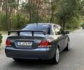 Серый Мицубиси Лансер, объемом двигателя 1.6 л и пробегом 250 тыс. км за 3999 $, фото 2 на Automoto.ua