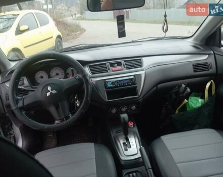 Серый Мицубиси Лансер, объемом двигателя 1.6 л и пробегом 175 тыс. км за 4200 $, фото 5 на Automoto.ua