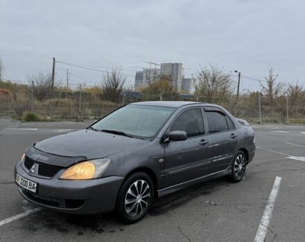 Серый Мицубиси Лансер, объемом двигателя 1.6 л и пробегом 350 тыс. км за 2850 $, фото 12 на Automoto.ua