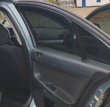 Сірий Міцубісі Lancer, об'ємом двигуна 2 л та пробігом 179 тис. км за 7700 $, фото 9 на Automoto.ua
