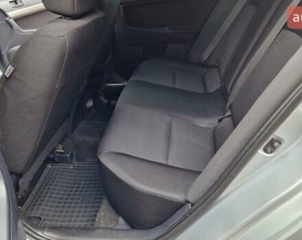 Серый Мицубиси Лансер, объемом двигателя 2 л и пробегом 213 тыс. км за 6550 $, фото 15 на Automoto.ua