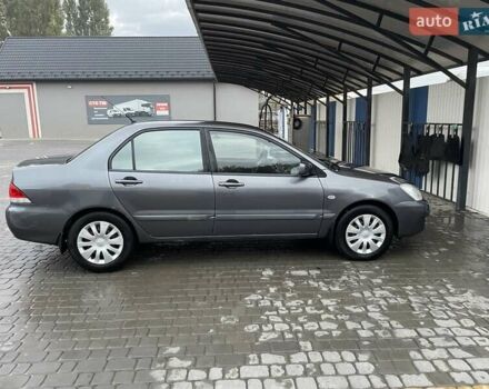 Сірий Міцубісі Lancer, об'ємом двигуна 1.6 л та пробігом 330 тис. км за 3500 $, фото 18 на Automoto.ua
