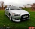 Сірий Міцубісі Lancer, об'ємом двигуна 2 л та пробігом 124 тис. км за 7499 $, фото 1 на Automoto.ua