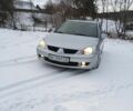 Серый Мицубиси Лансер, объемом двигателя 1.6 л и пробегом 230 тыс. км за 3400 $, фото 1 на Automoto.ua