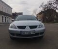 Сірий Міцубісі Lancer, об'ємом двигуна 1.6 л та пробігом 251 тис. км за 4500 $, фото 1 на Automoto.ua
