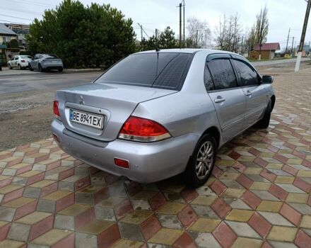 Серый Мицубиси Лансер, объемом двигателя 1.6 л и пробегом 238 тыс. км за 2900 $, фото 2 на Automoto.ua