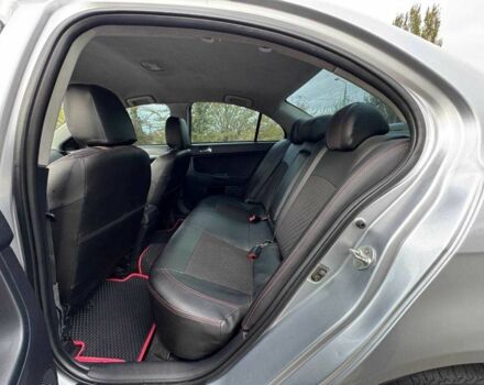 Серый Мицубиси Лансер, объемом двигателя 2 л и пробегом 207 тыс. км за 5800 $, фото 13 на Automoto.ua