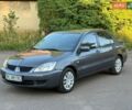 Сірий Міцубісі Lancer, об'ємом двигуна 1.6 л та пробігом 139 тис. км за 3450 $, фото 1 на Automoto.ua