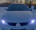 Сірий Міцубісі Lancer, об'ємом двигуна 1.6 л та пробігом 219 тис. км за 4400 $, фото 1 на Automoto.ua