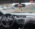 Серый Мицубиси Лансер, объемом двигателя 1.6 л и пробегом 218 тыс. км за 5000 $, фото 2 на Automoto.ua