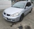 Сірий Міцубісі Lancer, об'ємом двигуна 1.6 л та пробігом 400 тис. км за 2500 $, фото 1 на Automoto.ua