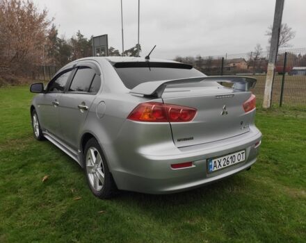 Серый Мицубиси Лансер, объемом двигателя 2 л и пробегом 124 тыс. км за 7499 $, фото 4 на Automoto.ua