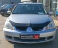 Сірий Міцубісі Lancer, об'ємом двигуна 1.6 л та пробігом 222 тис. км за 3990 $, фото 1 на Automoto.ua