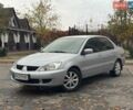 Сірий Міцубісі Lancer, об'ємом двигуна 1.6 л та пробігом 185 тис. км за 4499 $, фото 1 на Automoto.ua