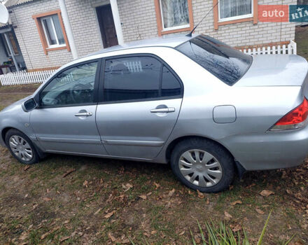 Сірий Міцубісі Lancer, об'ємом двигуна 1.58 л та пробігом 220 тис. км за 5000 $, фото 2 на Automoto.ua