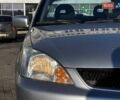 Сірий Міцубісі Lancer, об'ємом двигуна 1.6 л та пробігом 237 тис. км за 4950 $, фото 3 на Automoto.ua