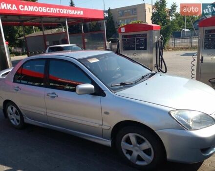 Серый Мицубиси Лансер, объемом двигателя 1.6 л и пробегом 210 тыс. км за 3500 $, фото 5 на Automoto.ua