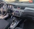 Сірий Міцубісі Lancer, об'ємом двигуна 1.58 л та пробігом 122 тис. км за 6300 $, фото 35 на Automoto.ua