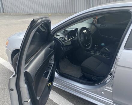 Серый Мицубиси Лансер, объемом двигателя 1.5 л и пробегом 188 тыс. км за 4999 $, фото 7 на Automoto.ua