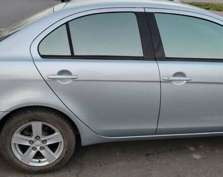 Серый Мицубиси Лансер, объемом двигателя 1.5 л и пробегом 201 тыс. км за 5600 $, фото 1 на Automoto.ua