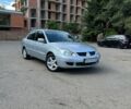 Сірий Міцубісі Lancer, об'ємом двигуна 1.6 л та пробігом 205 тис. км за 4450 $, фото 1 на Automoto.ua