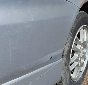 Серый Мицубиси Лансер, объемом двигателя 2 л и пробегом 297 тыс. км за 4600 $, фото 8 на Automoto.ua