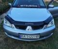 Сірий Міцубісі Lancer, об'ємом двигуна 1.6 л та пробігом 290 тис. км за 4600 $, фото 2 на Automoto.ua