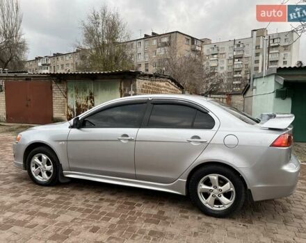 Серый Мицубиси Лансер, объемом двигателя 2 л и пробегом 180 тыс. км за 6799 $, фото 9 на Automoto.ua