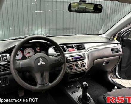 Сірий Міцубісі Lancer, об'ємом двигуна 1.6 л та пробігом 193 тис. км за 3999 $, фото 10 на Automoto.ua