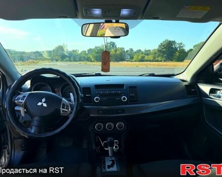 Сірий Міцубісі Lancer, об'ємом двигуна 2 л та пробігом 288 тис. км за 5200 $, фото 6 на Automoto.ua