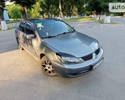 Сірий Міцубісі Lancer, об'ємом двигуна 1.6 л та пробігом 230 тис. км за 3950 $, фото 3 на Automoto.ua